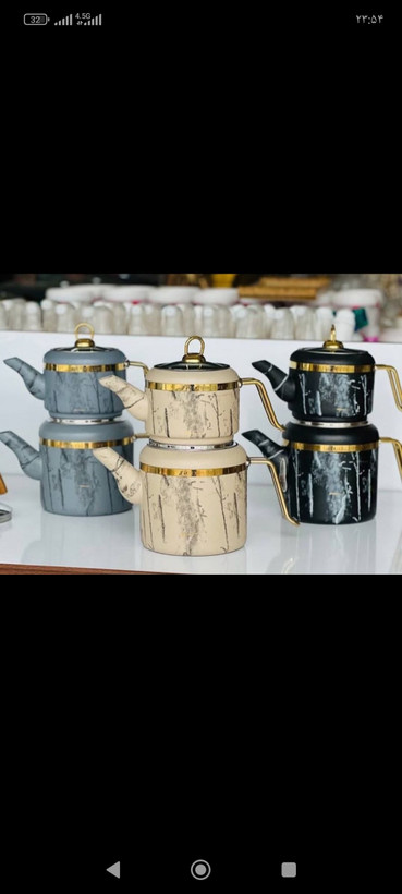 کتری وقوری زیو مدل8014 جنس بدنه آلومینیوم روکش گرانیت جنس دسته ها استیل ضد خش حجم قوری 1.25 لیتر حجم کتری 2.25 لیتر جنس بدنه تکنولوژی C3.